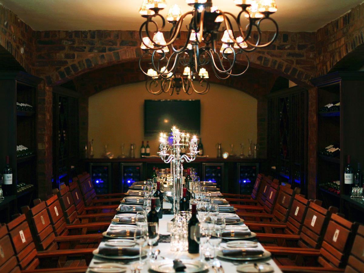 Kloofzicht Lodge & Spa Krugersdorp Exterior photo The wine cellar at the restaurant